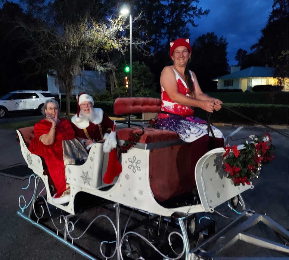 Our sleigh bringing Santa and Mrs. Claus in a parade in Alachua, Florida.