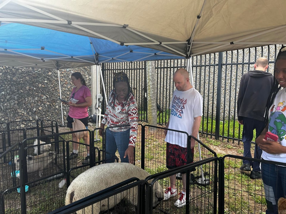 Here's our petting zoo enjoying visiting with a special needs facility in Jackonville, Florida.