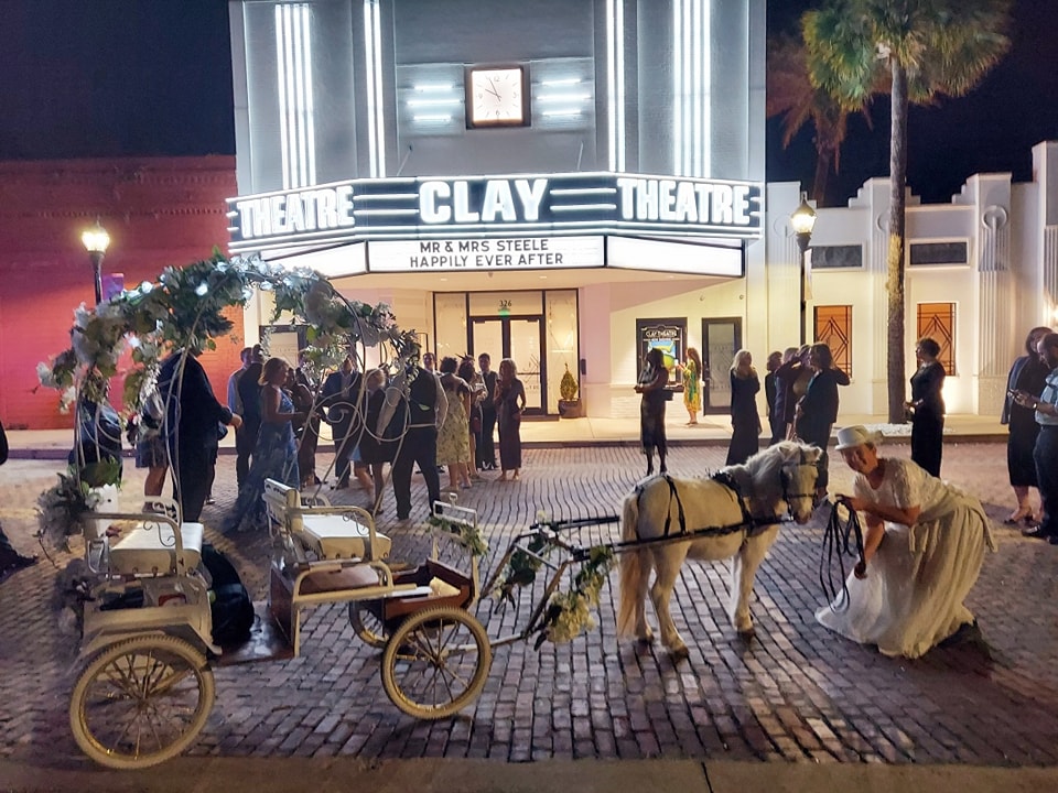 Here's our Mini Cinderella Carriage waiting for our bride and groom for a ride after their wedding reception at the lovely Clay Theatre in Green Cove Springs, FL.