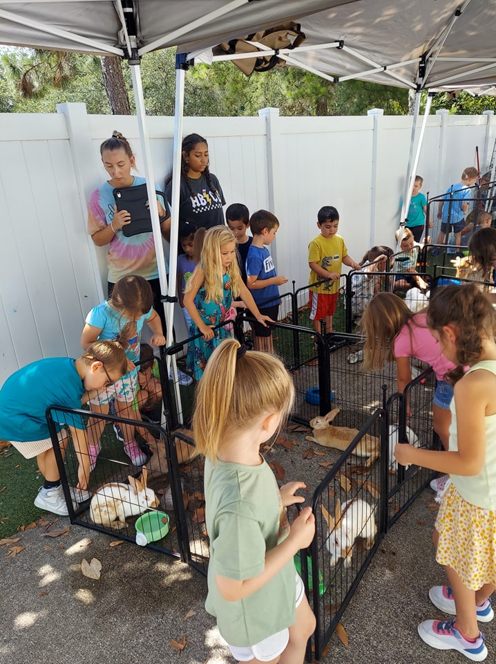 There are so many smiles around our petting zoo with the kids and teachers at this summer camp in Jacksonville, FL.