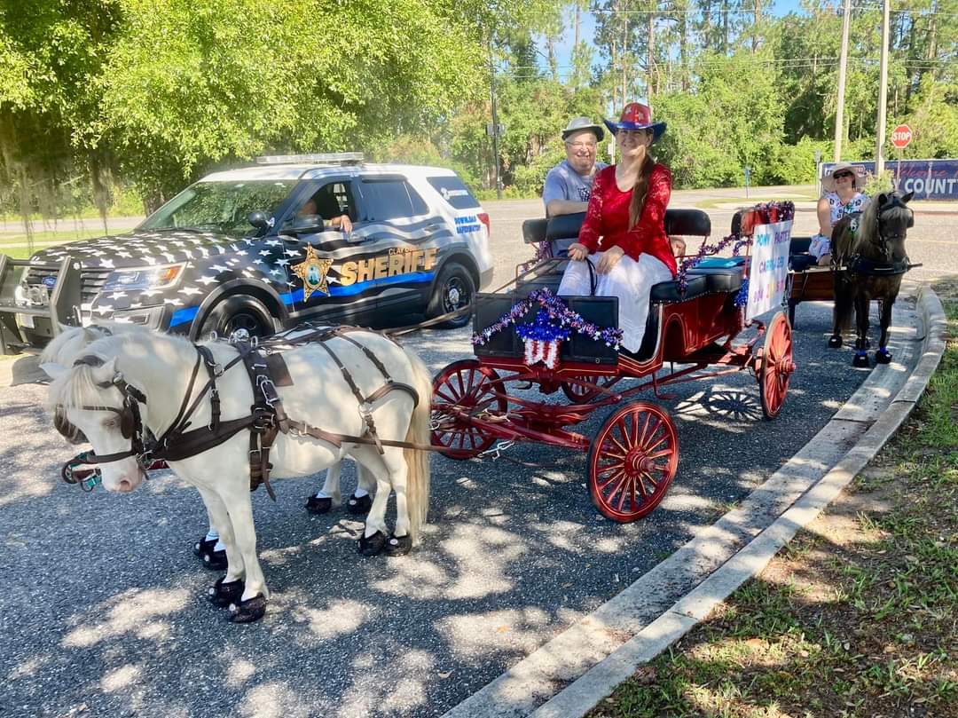 Here's our Lil Red Wagon with our friends Lily and Jenn doing a parade during 4th of July in Fleming Island, FL.