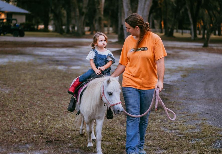 Giving a pony ride at a birthday party in St. Augustine, Florida.